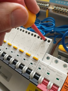 Inside a newer model consumer unit, with individual circuit protection.